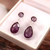 beautiful earrings which contains absolutely gorgeous and rare alexandrite .