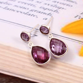 beautiful earrings which contains absolutely gorgeous and rare alexandrite .